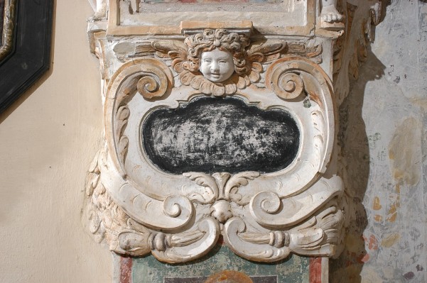 Bottega lombarda (1658), Cartiglio con cherubino