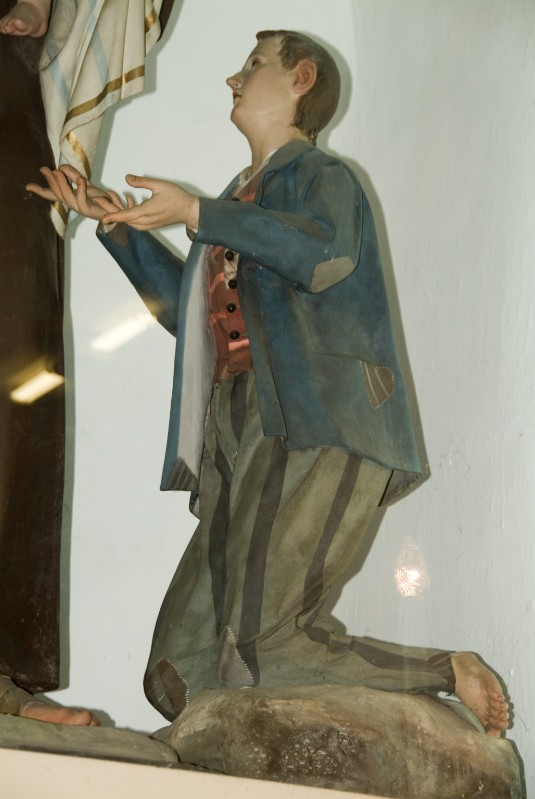 Caretta R. (1923), Statua di fanciullo