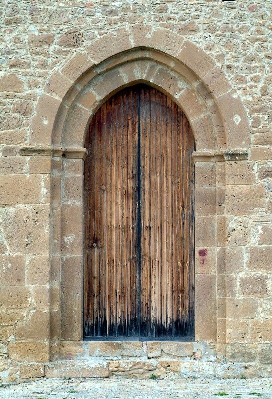 Ambito romanico-lombardo (1096), Portale laterale