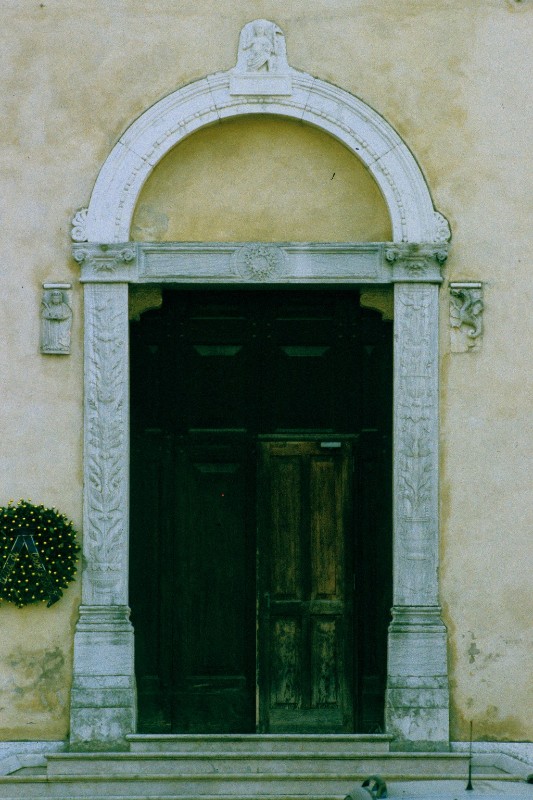 Bottega vicentina sec. XV, Mostra del portale laterale con simbolo bernardiniano
