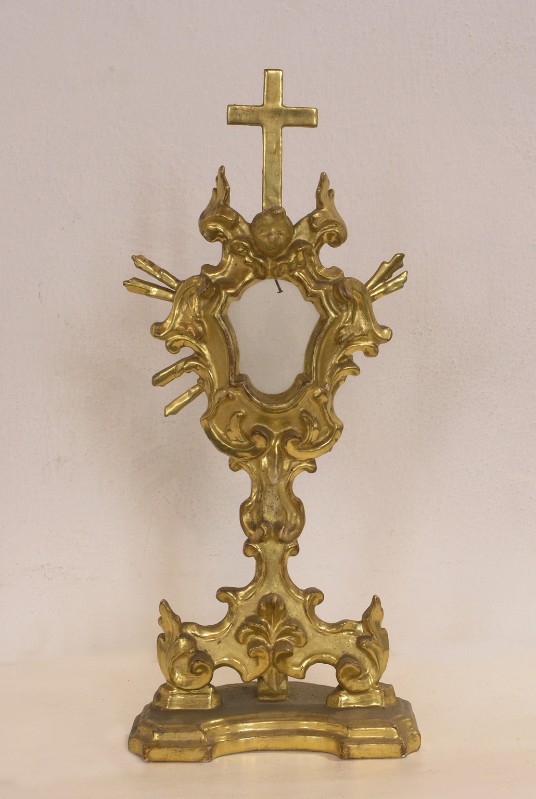 Bottega pratese sec. XVIII, Reliquiario in legno dorato con cherubino
