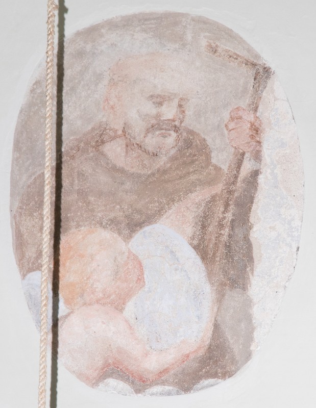 Ambito toscano sec. XVII, Dipinto murale Santo con saio e bastone e angelo