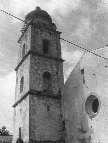 Il campanile  e la facciata posteriore della Chiesa di San Donato Vescovo e  Martire